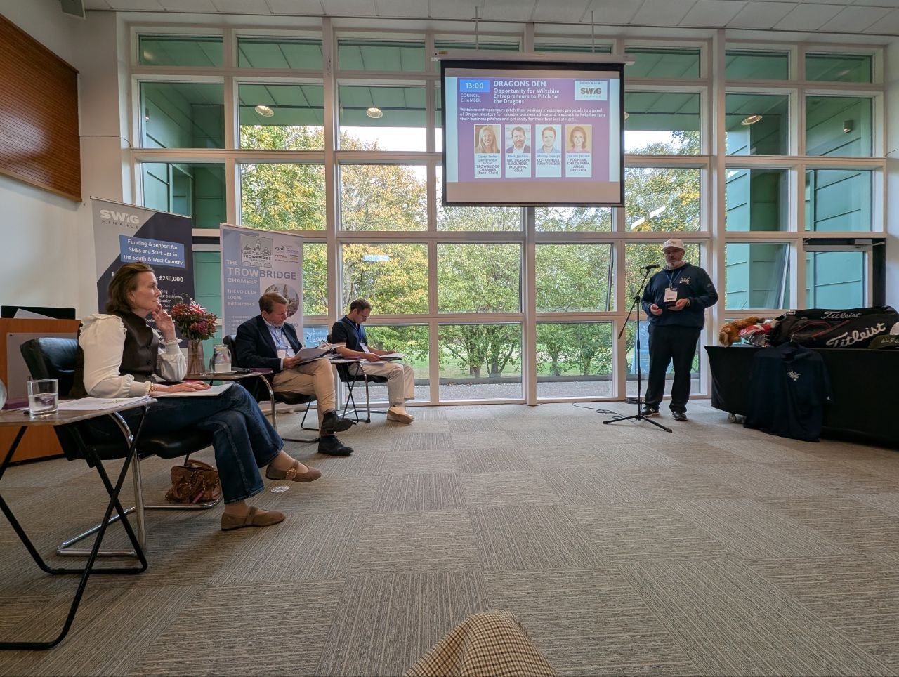 An entrepreneur pitching to the Dragons' Den panel at the West Wiltshire Business Expo